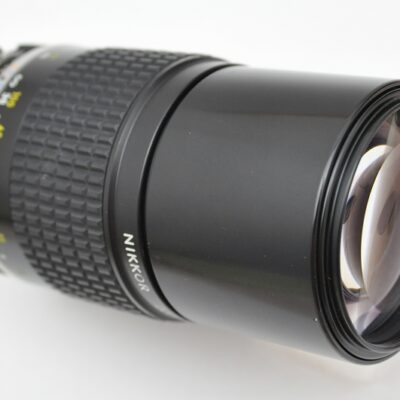 Nikon Nikkor 200mm 4.0 - AIS - leichtes, exellentes Teleobjektiv mit eingebauter Gegenlichtblende - hervorragende optische Qualität